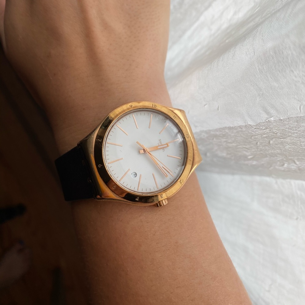 Gold and brown leather swatch watch
